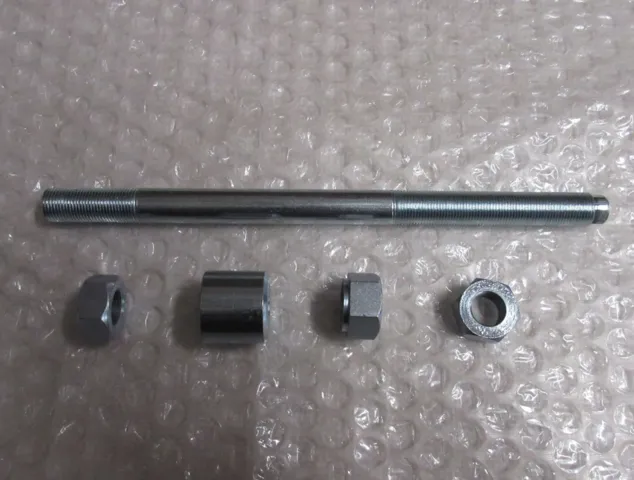 BAGHJULS AKSEL Ø 12 MM., STJERNEFÆLG+FASTE LEJER