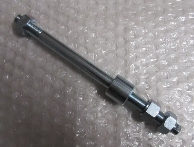 BAGHJULS AKSEL Ø 12 MM., STJERNEFÆLG+FASTE LEJER